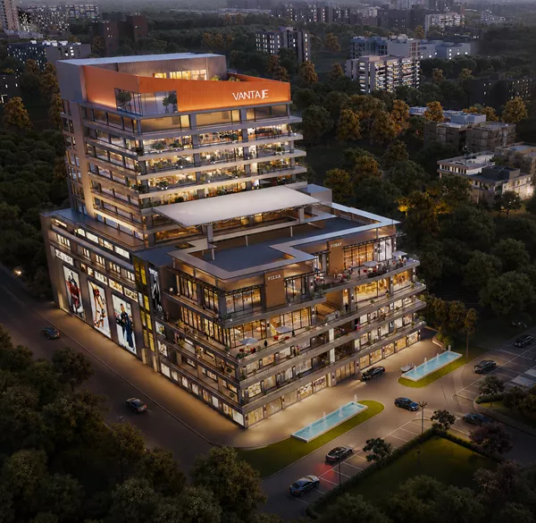 Aerial view of Aura Vantaje luxury mixed-use commercial development featuring retail shops, restaurants, and premium office spaces